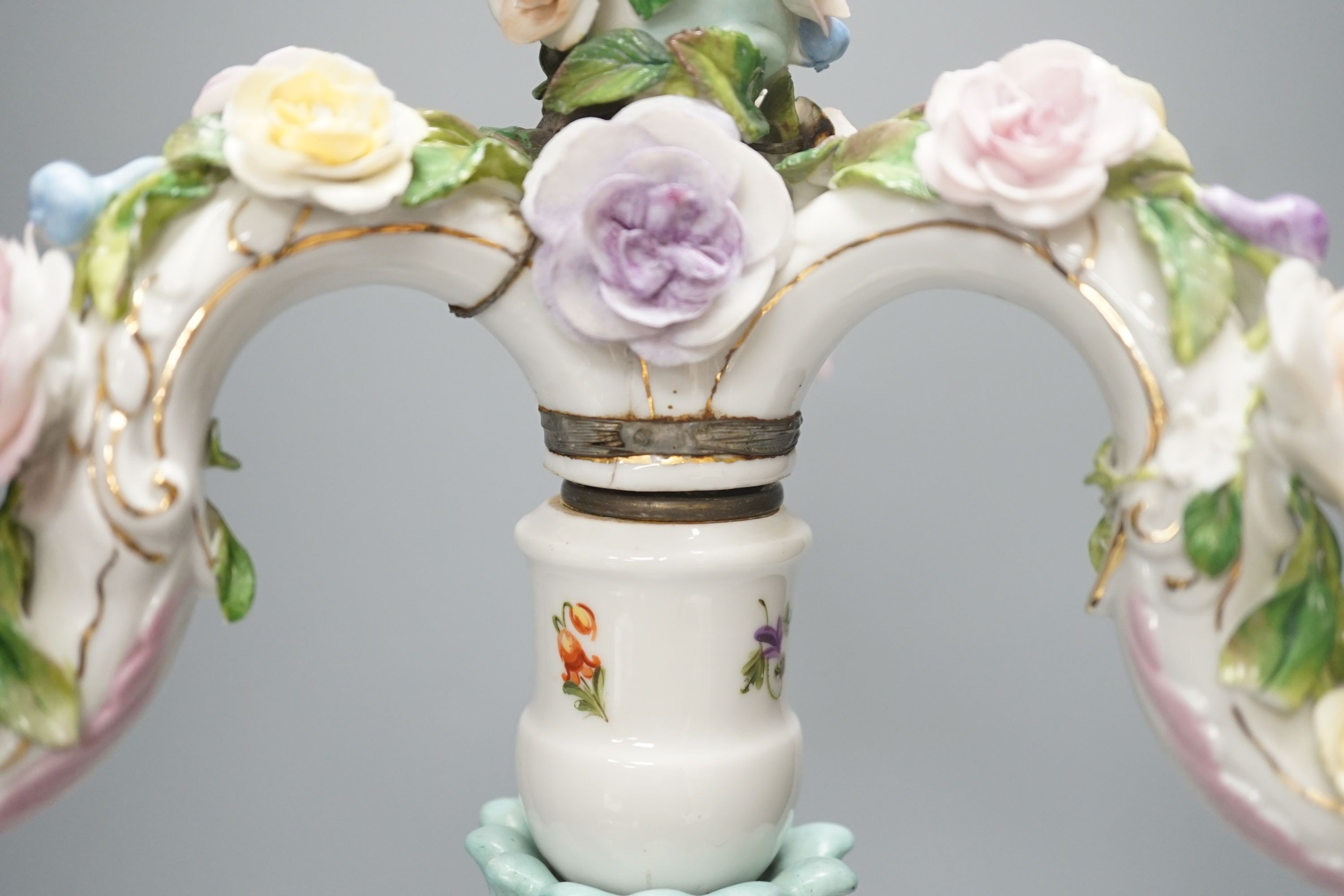 A Sitzendorf three branch candelabrum, 51.5 cms high.